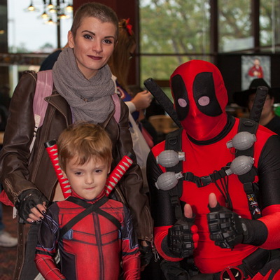 Archon attendees in red and black costumes.